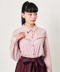 Blouse with chain brooch